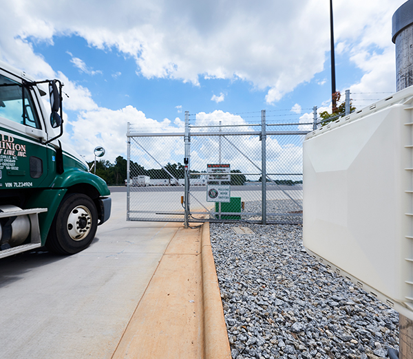 OD Truck pulling into Gate at Service Center