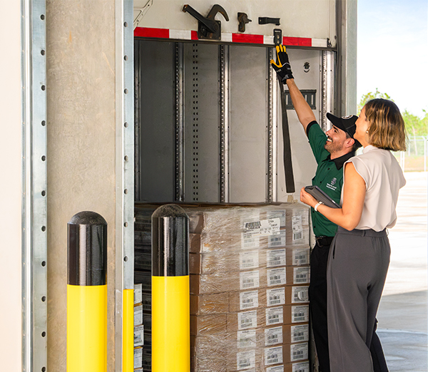 OD driver showing customer freight on loading dock